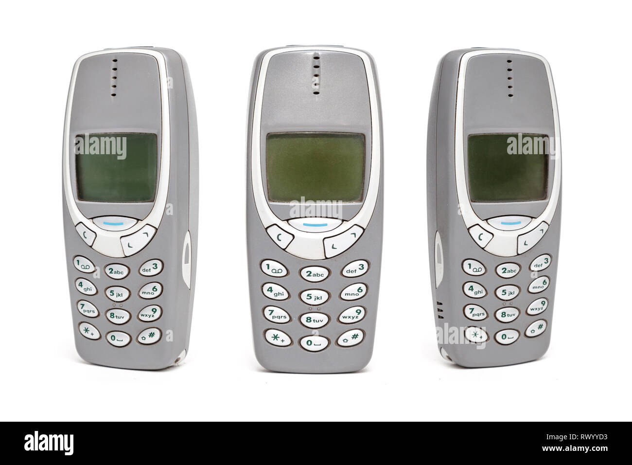 Altes Mobiltelefon auf weißem Hintergrund. Stockfoto