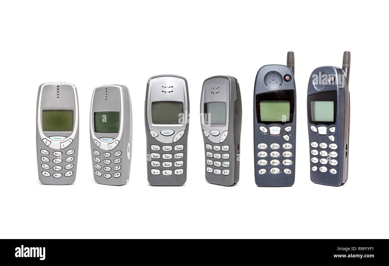 Altes Mobiltelefon auf weißem Hintergrund. Stockfoto