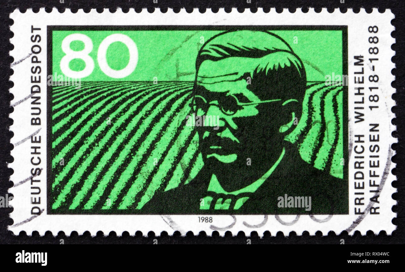 Deutschland - ca. 1988: einen Stempel in Deutschland bedruckt zeigt Friedrich Wilhelm Raiffeisen, deutscher Major und Kooperativen Pioneer, ca. 1988 Stockfoto