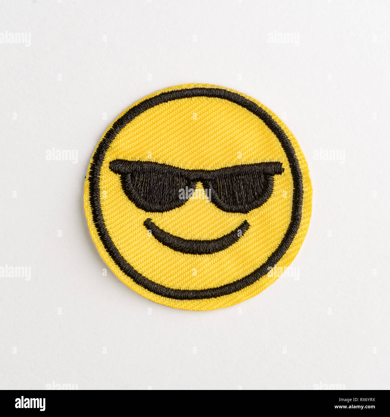 Emoji Lächeln bestickt Patch Stockfoto