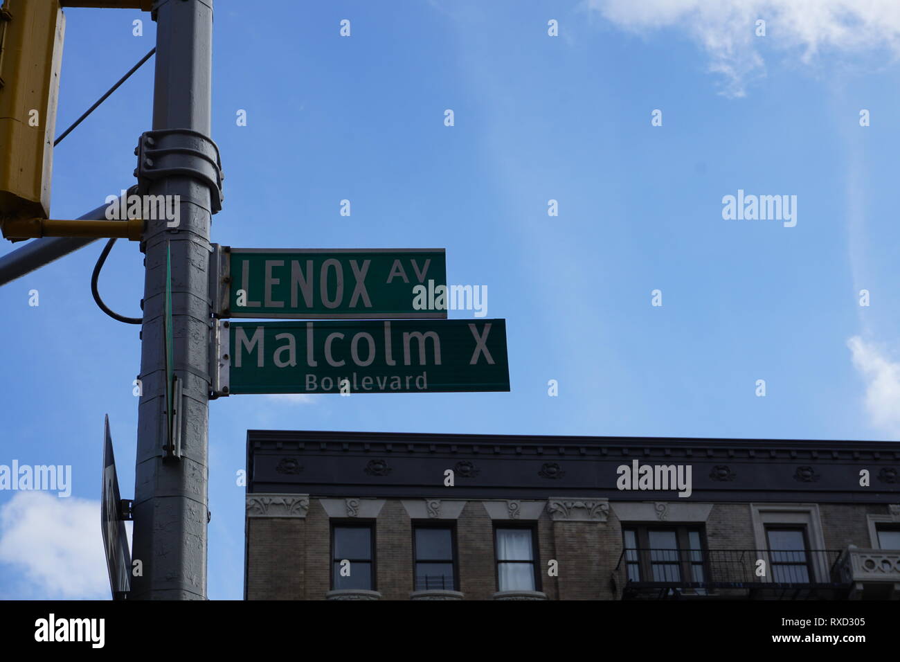 Harlem, New York, Malcom X Boulevard und Lenox Avenue street sign Stockfoto