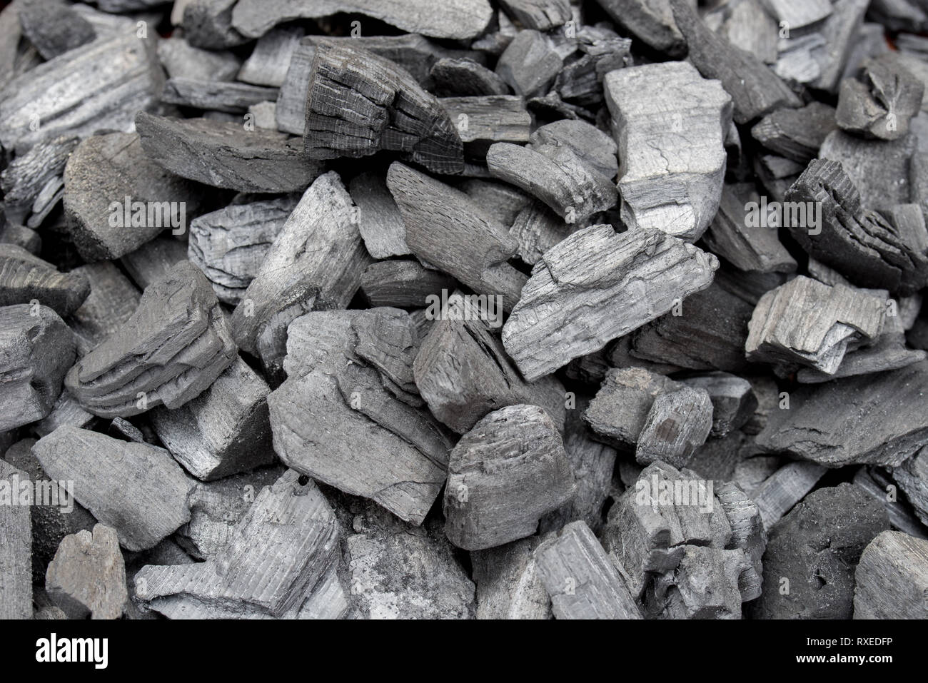 Black Charcoal haufen Textur Hintergrund selektiven Fokus Stockfoto