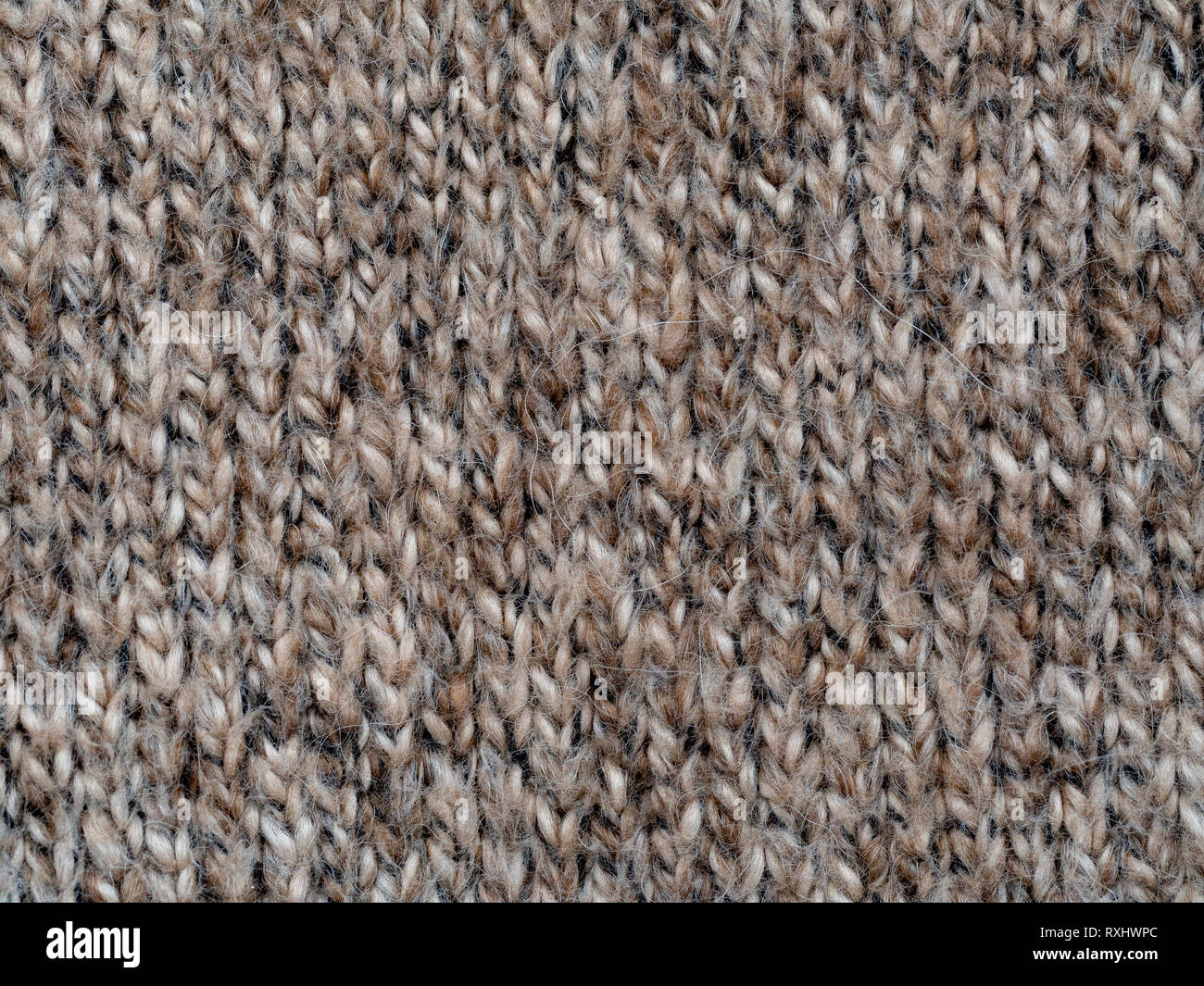 Hellbraun handgemachte wolle Strickmuster makro details Stockfoto