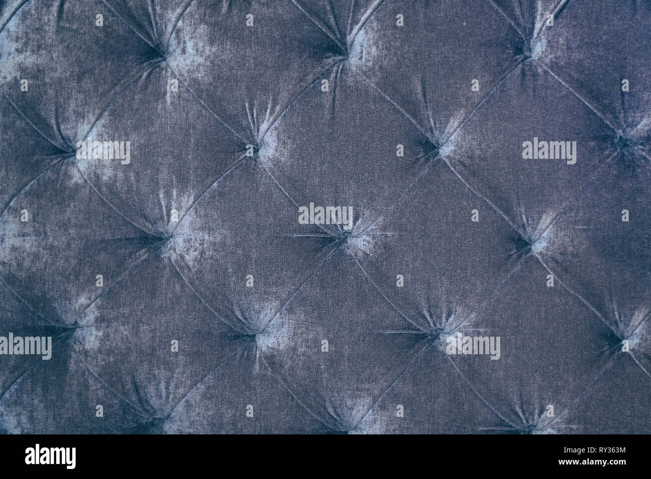 Grauer Hintergrund Textur des sofa Polster Stockfoto