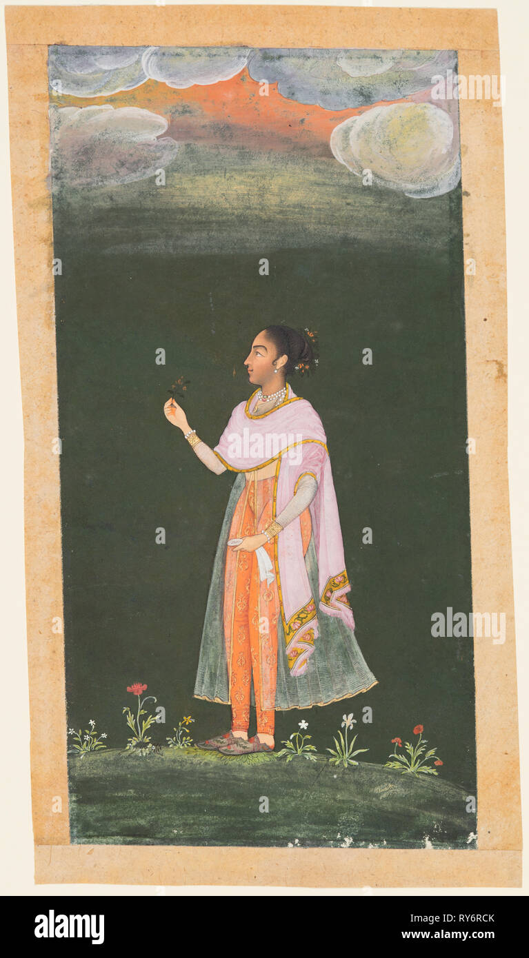 Frau mit Blume, C. 1670 s - 80 s. Nordwestliche Indien, Rajasthan, Rajput Königreich von Bikaner. Opak Aquarell und Gold auf Papier; Miniatur: 19,7 x 10 cm (7 3/4 x 3 15/16 in Stockfoto