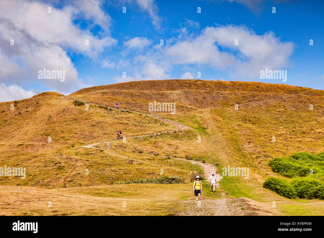 Wanderer zu Fuß von Millenium Hill, Malvern Hills, Herefordshire und Worcestershire, England Stockfoto