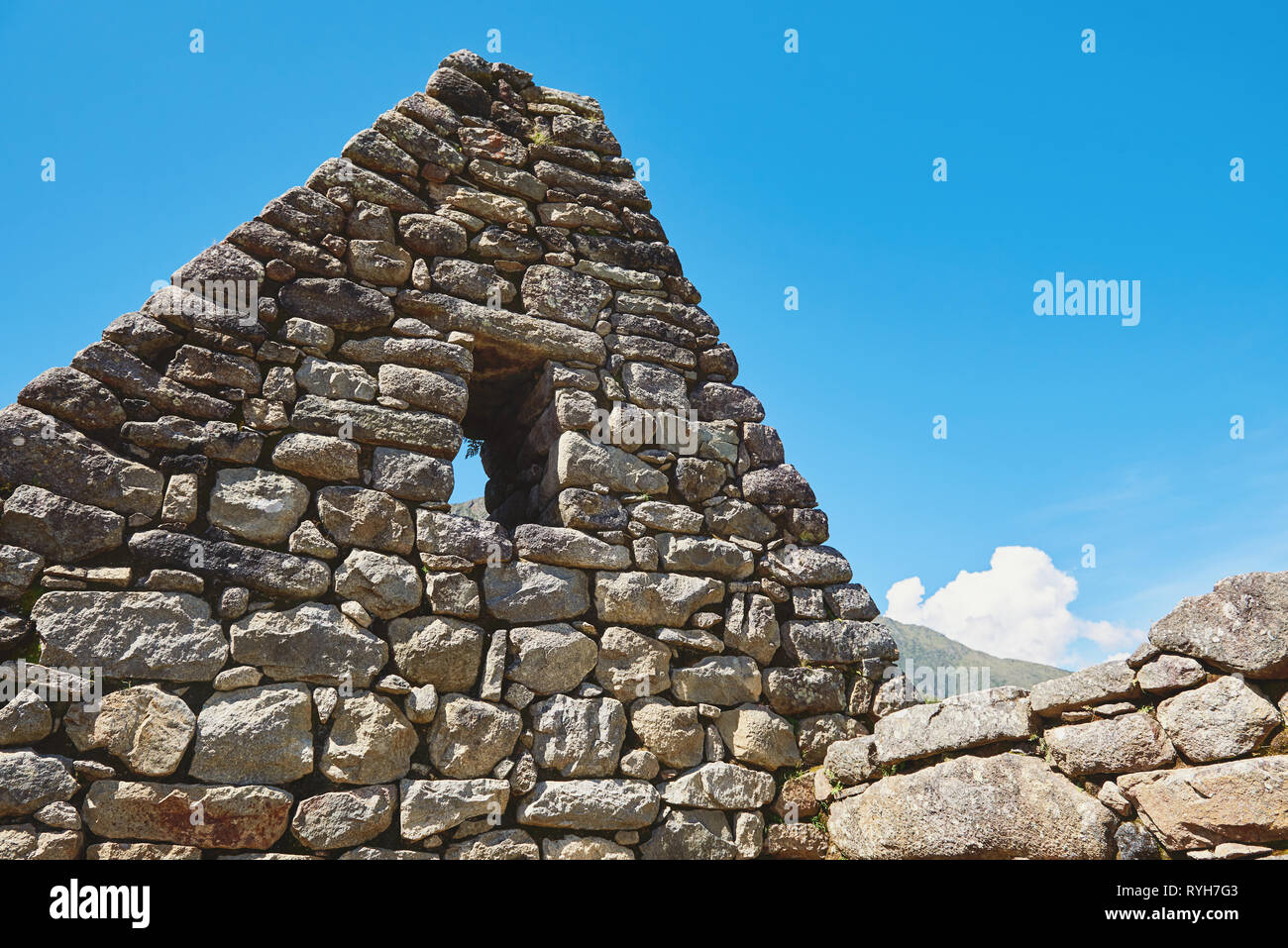 Steinmauer von Inca Haus in Machu Picchu Peru Stockfoto
