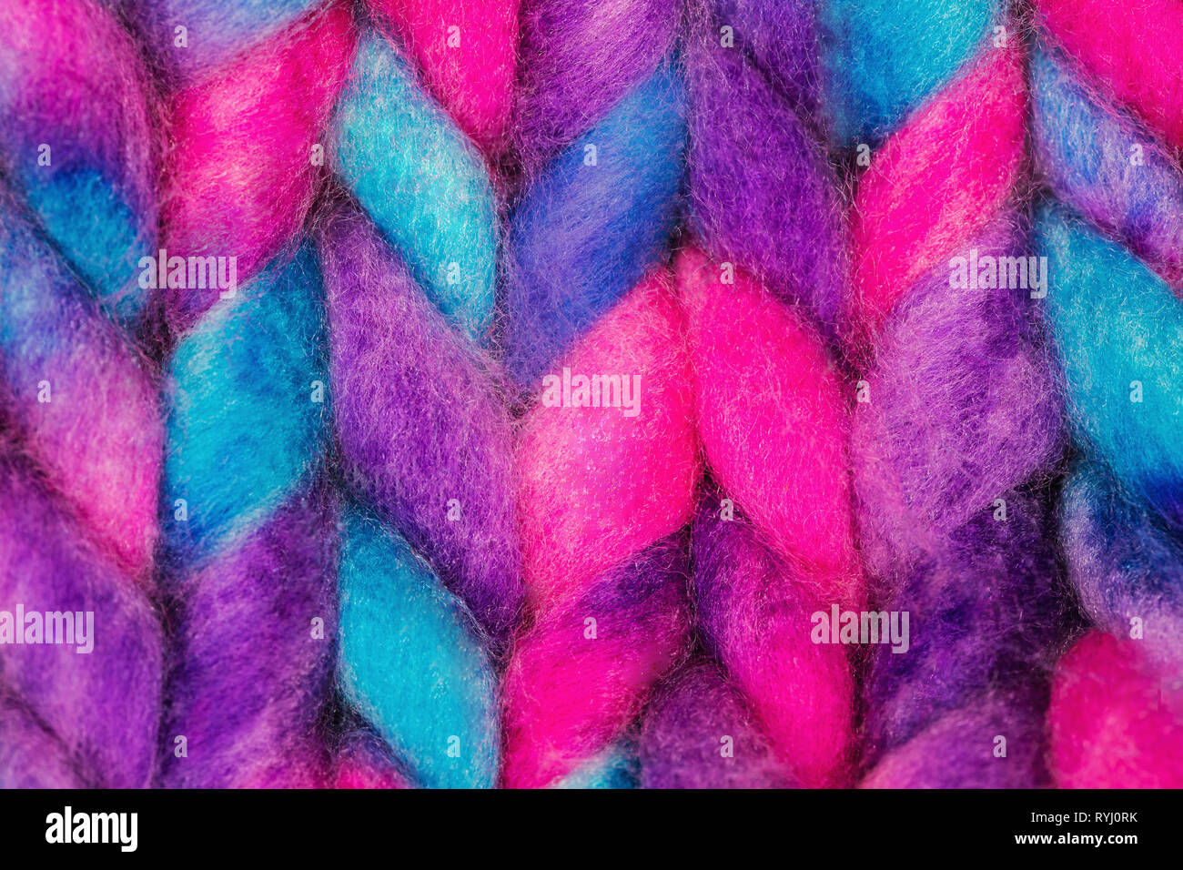 Bunte Merinowolle Textur hautnah. Gestrickte Hintergrund Stockfoto