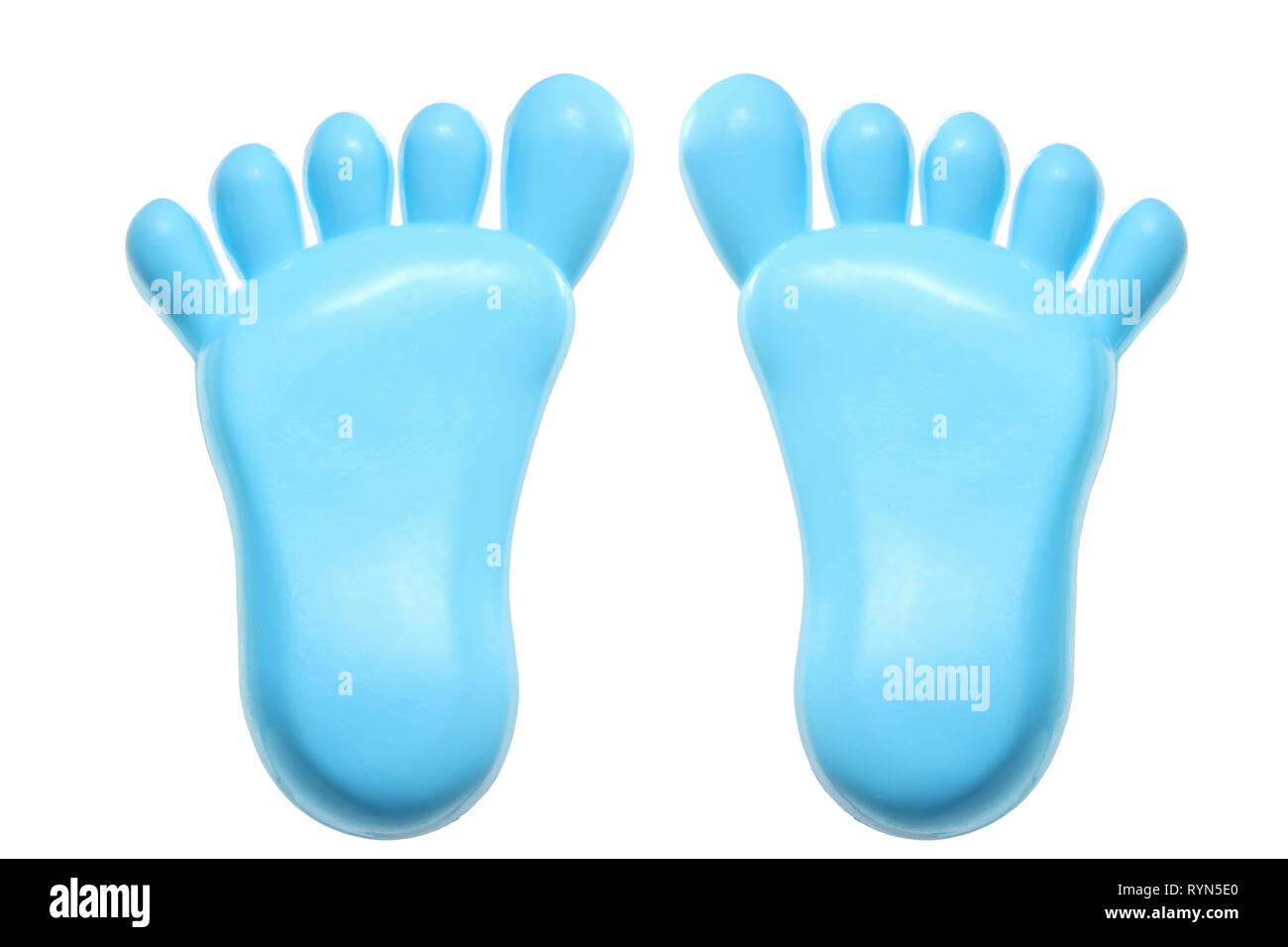 Kunststoff Spielzeug Füße auf weißem Hintergrund Stockfoto