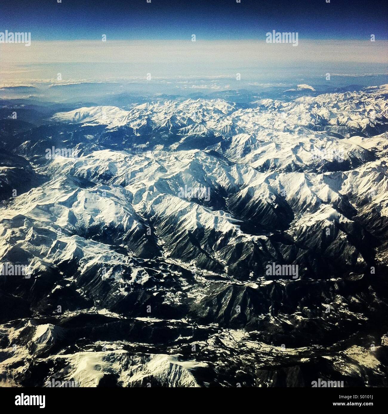 Schneebedeckte Gebirge Luftbild Stockfoto