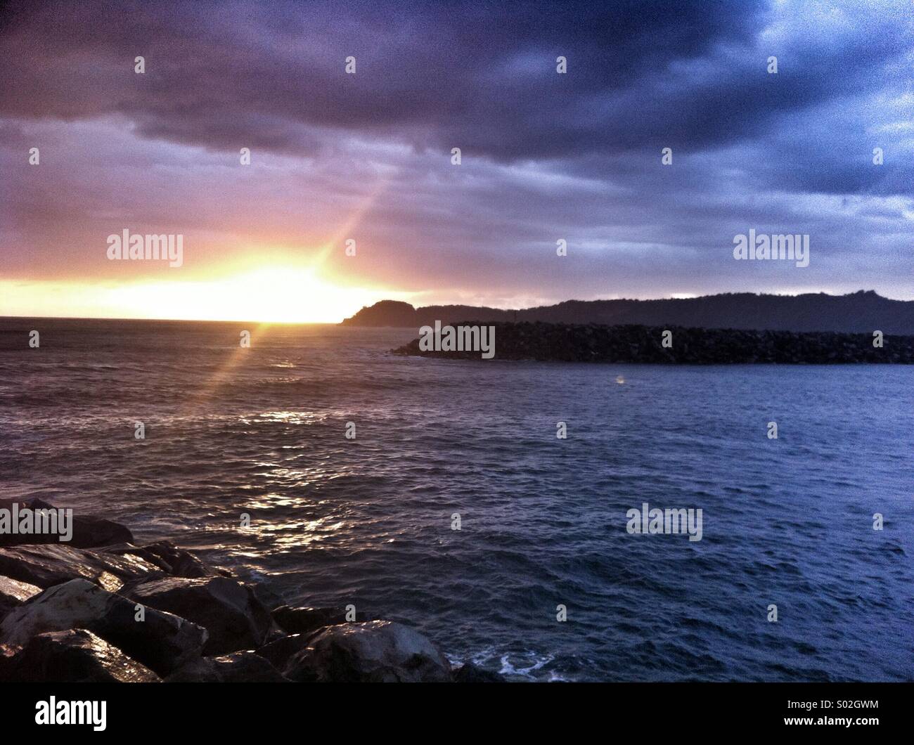 Sonnenaufgang am New Years Day 2014 in North Haven, NSW, Australien Stockfoto