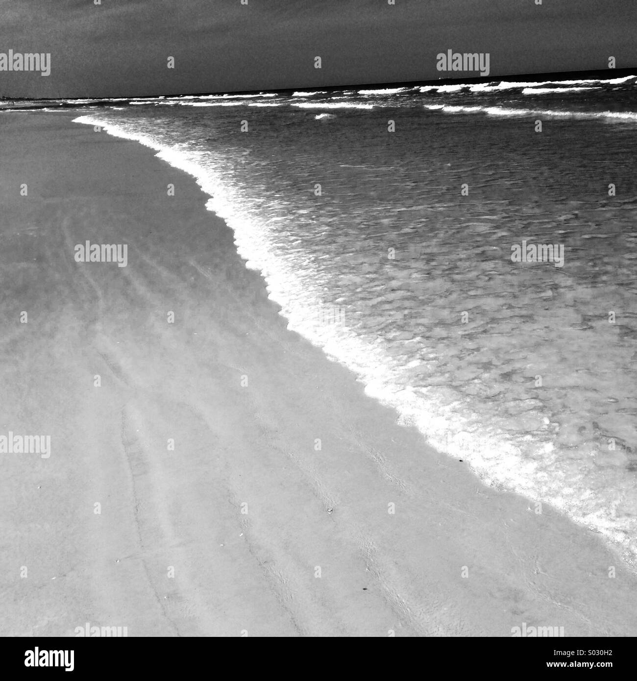 Meer und Sand, Neptune Beach, Florida. Stockfoto
