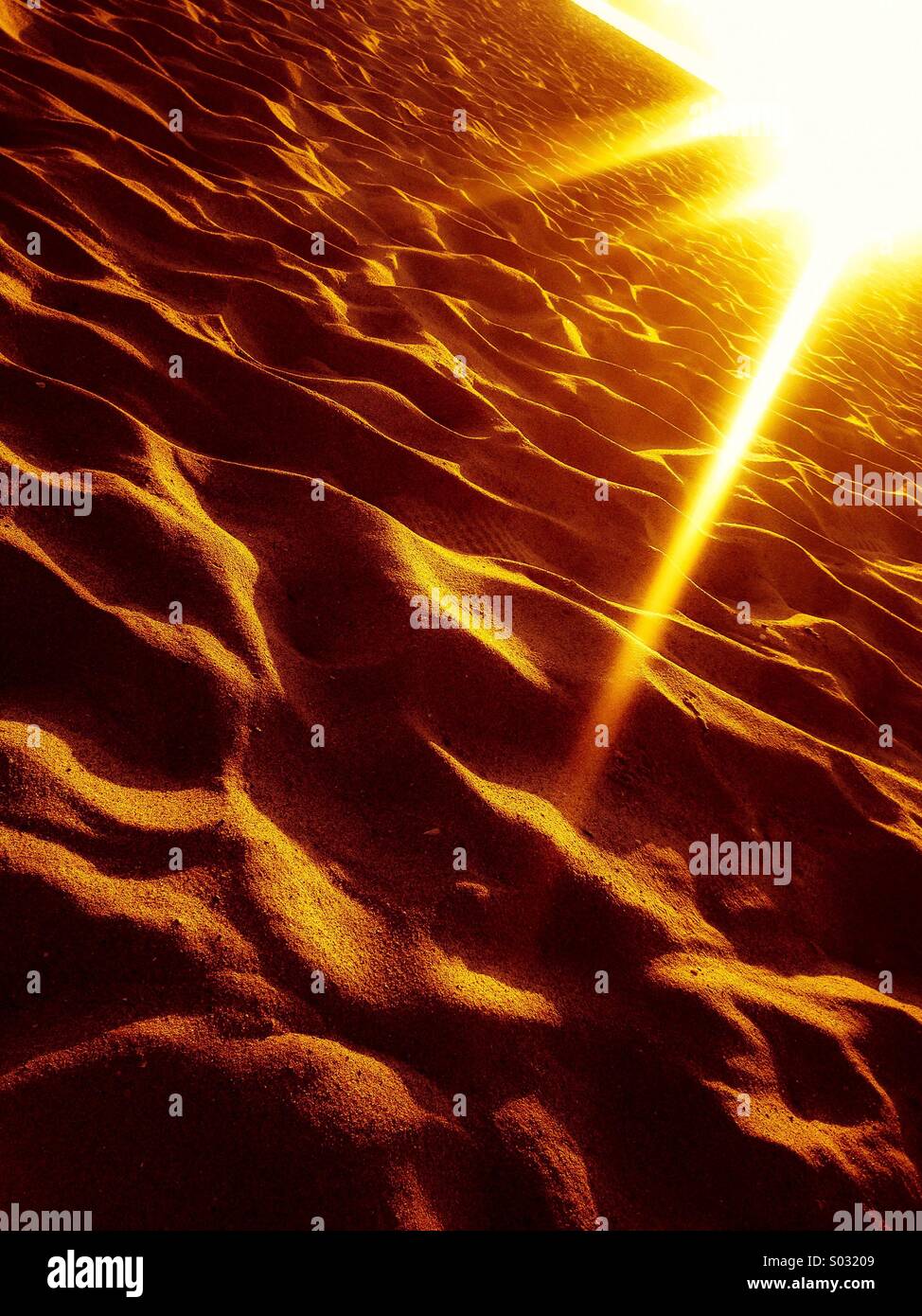 Sonnenaufgang am sand Stockfoto