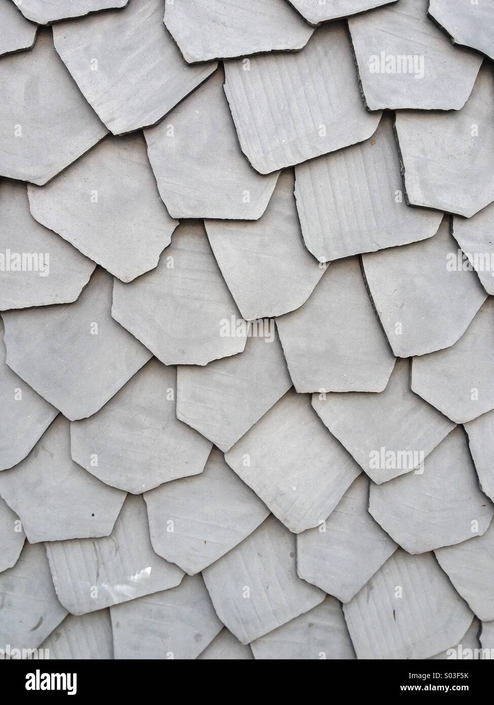 Grauen Stein Wandfliese - Smartphone-aufgenommenes Stockfoto