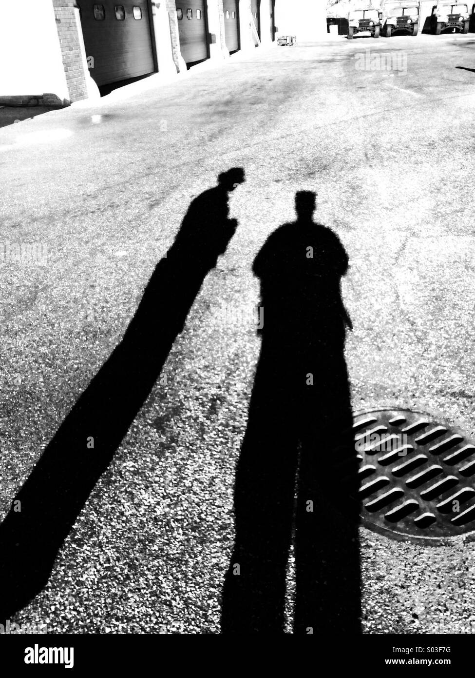 Der Tag zieht unsere Schatten heraus Stockfoto