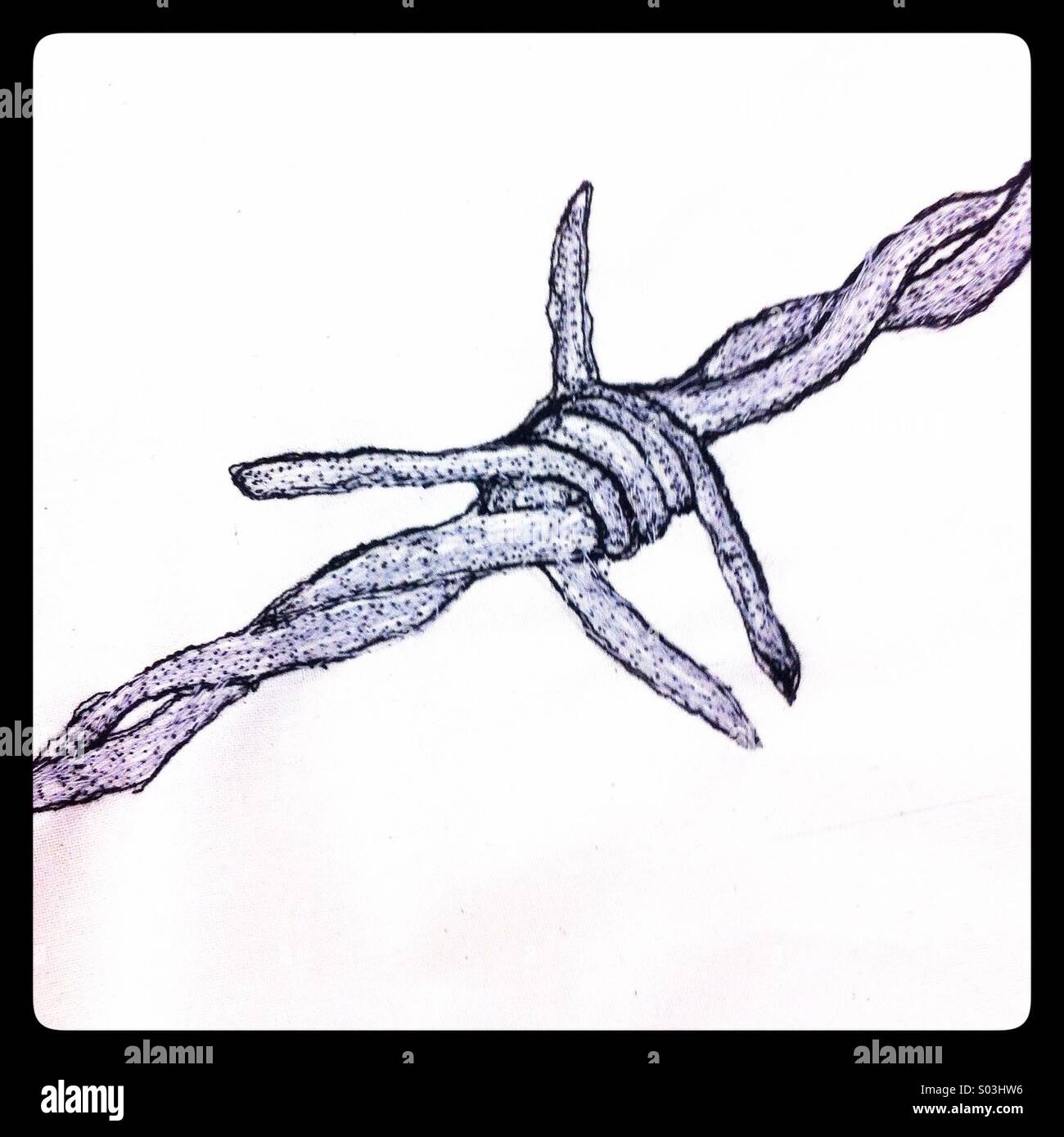 Bestickte Stacheldraht - Smartphone-aufgenommenes Stockfoto