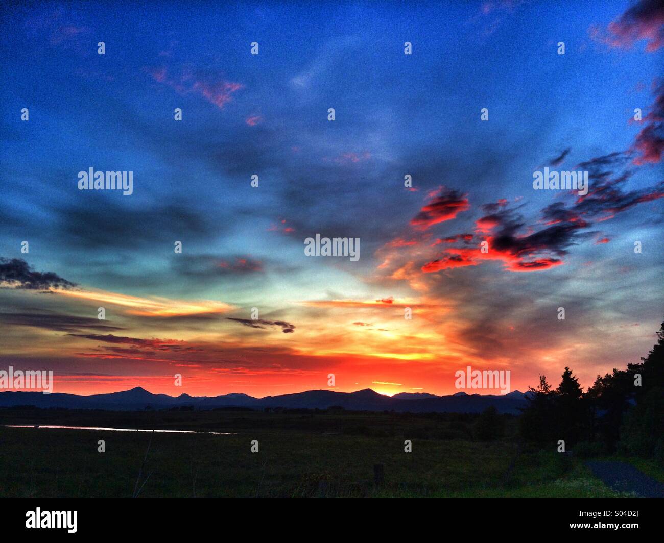 Dramatischen Sonnenuntergang über Fintry, Glasgow, Schottland, Großbritannien Stockfoto