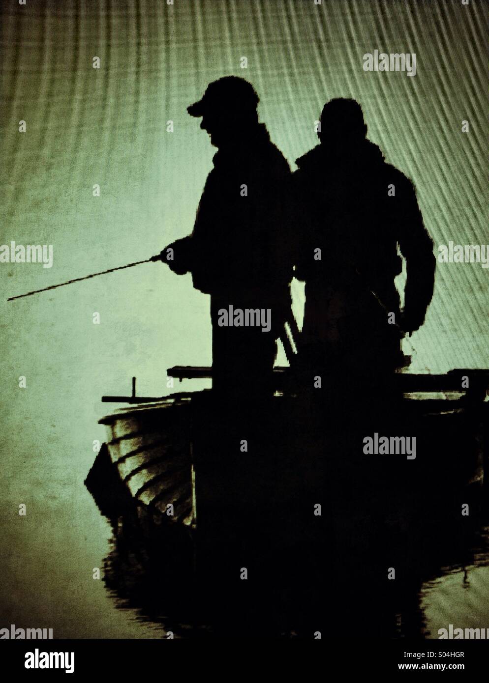 Zwei Fischer in den Abend Trübsinn Stockfoto