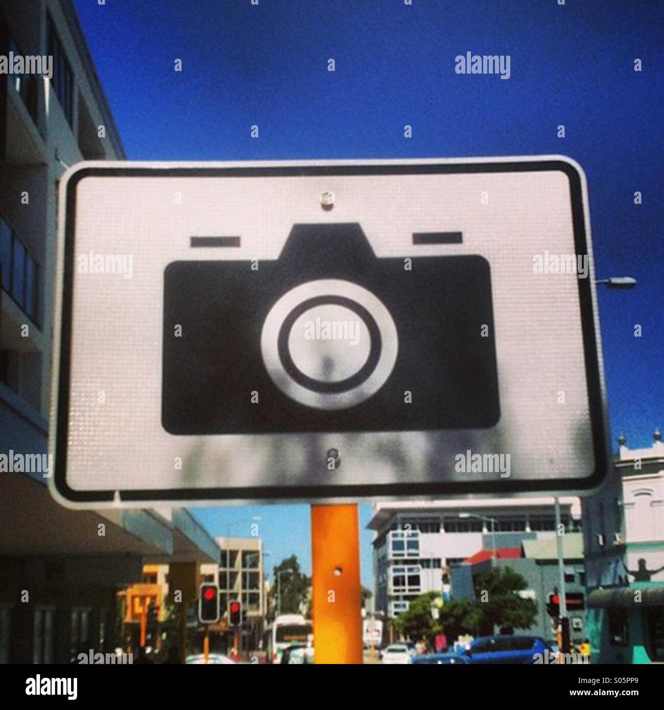 Kamera-Symbol auf einem Wegweiser Stockfoto