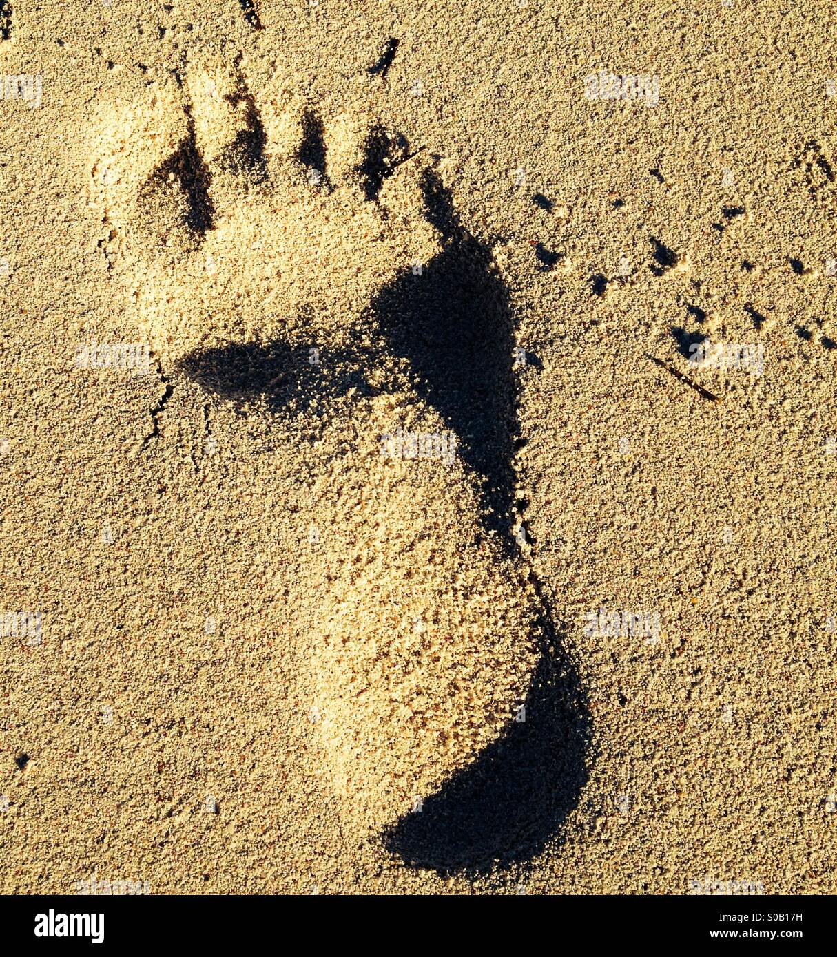 Füße im sand Stockfoto