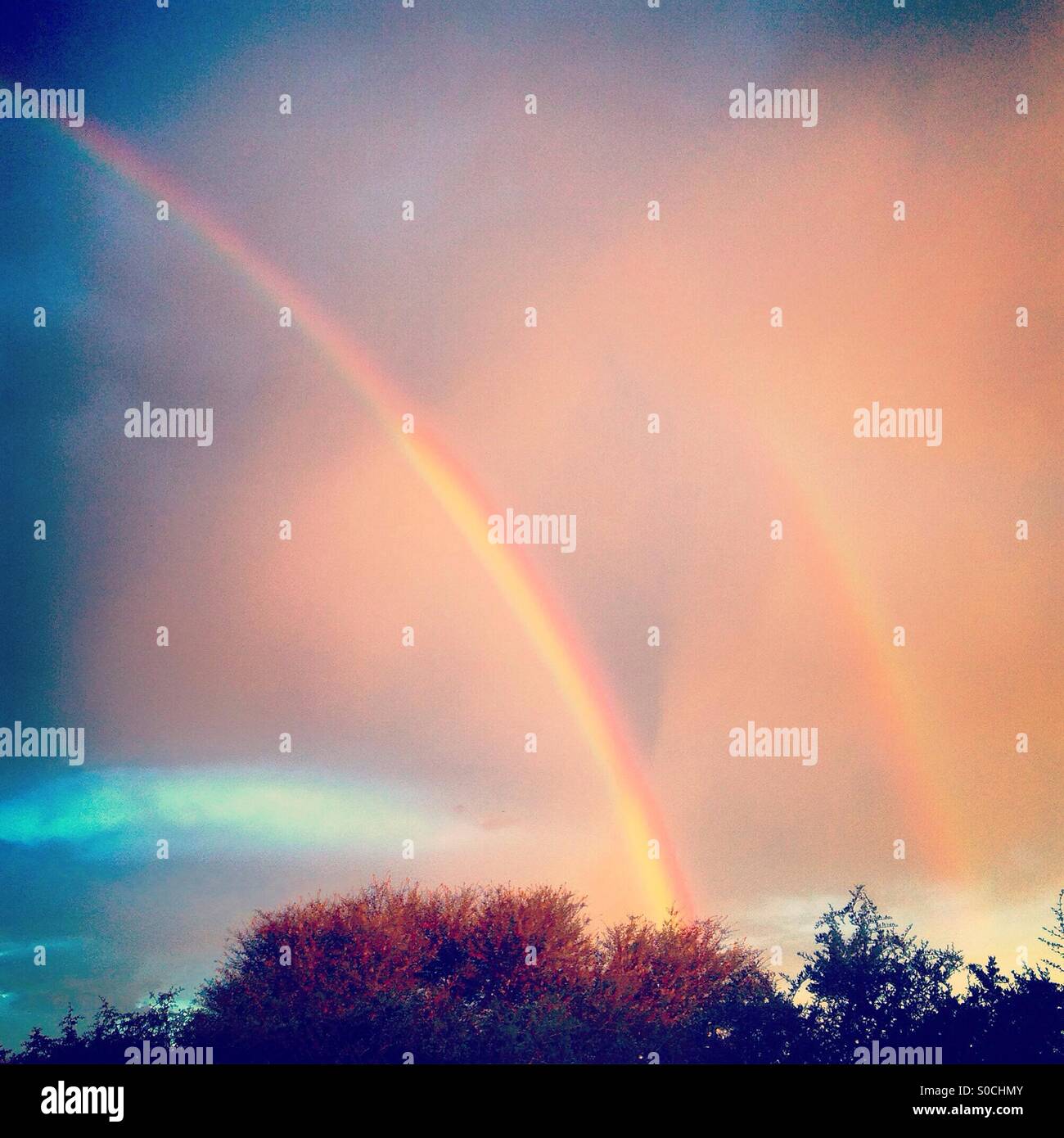 Doppelter Regenbogen Stockfoto