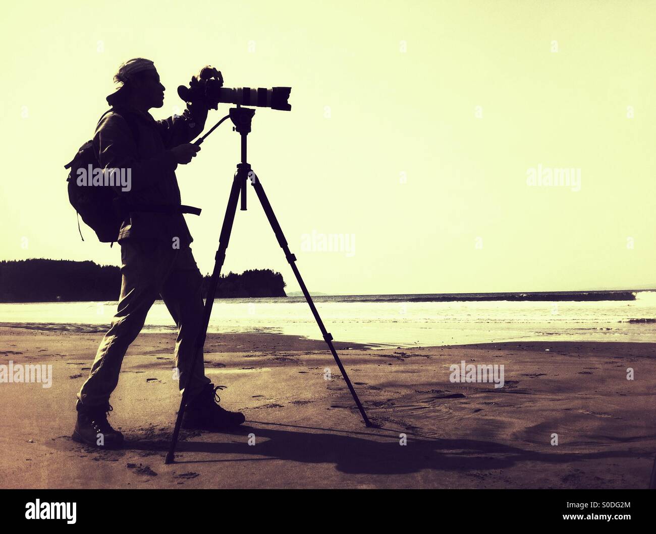 Fotograf am Strand - Smartphone-aufgenommenes Stockfoto