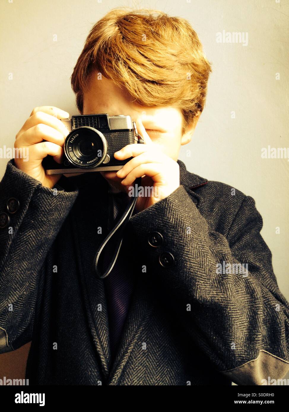 Behaarte junge Ingwer eine Aufnahme mit einer Olympus Pen-Halbformat-Film-Kamera - Smartphone-aufgenommenes Stockfoto