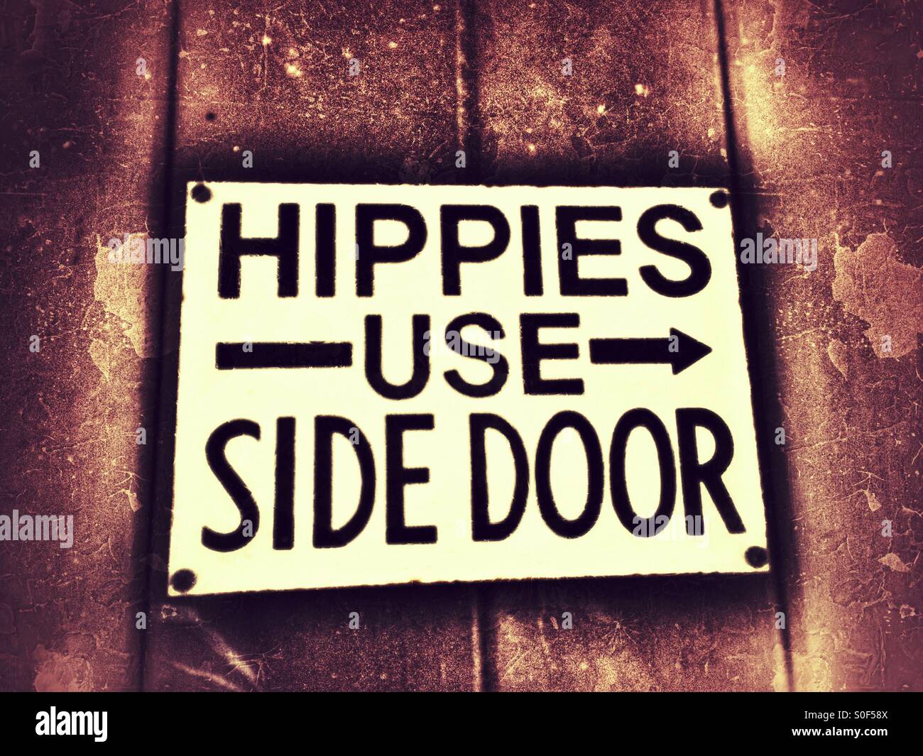 Hippies verwenden Seite Türschild Stockfoto