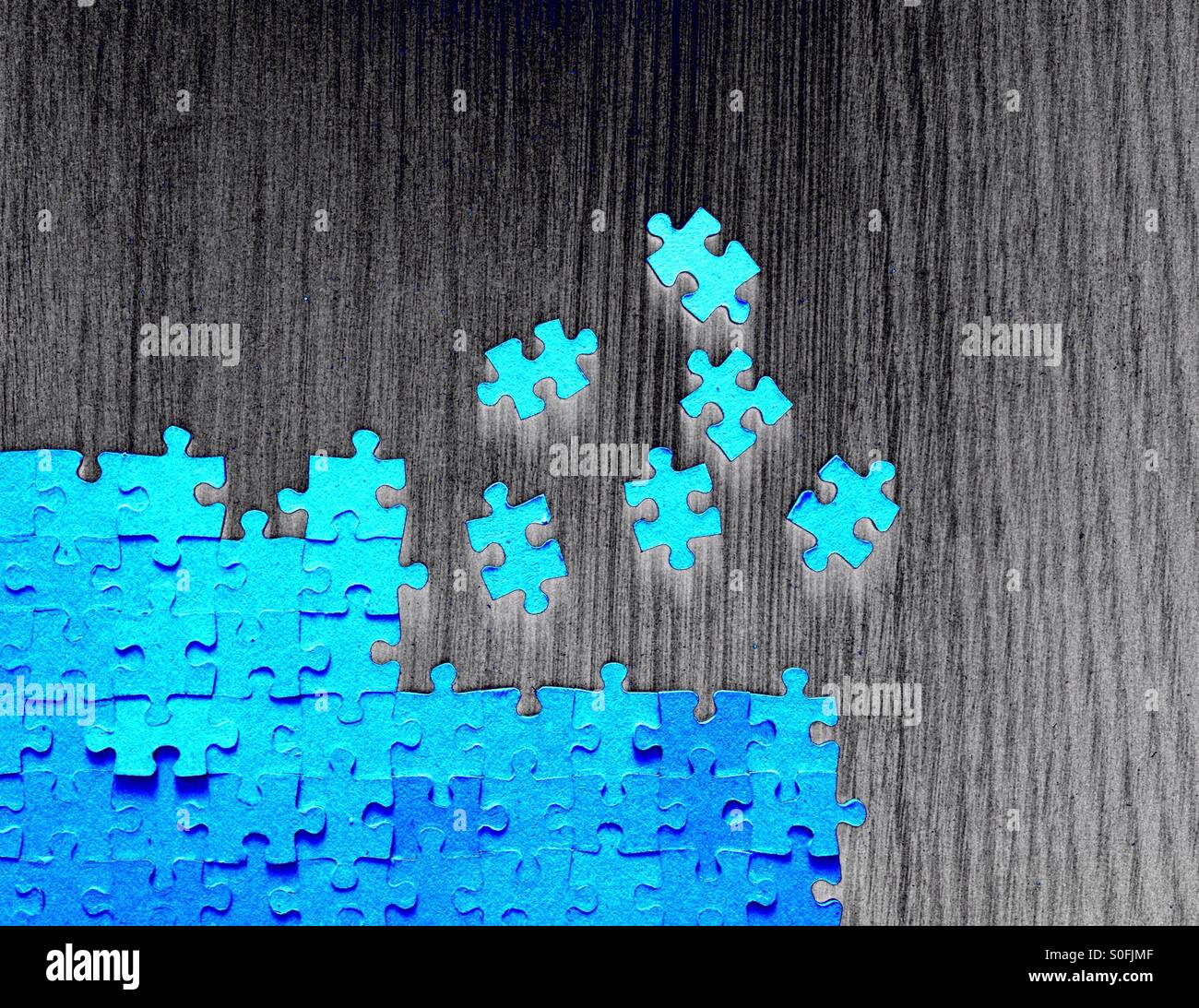 Unvollständige Jigsaw puzzle - Smartphone-aufgenommenes Stockfoto