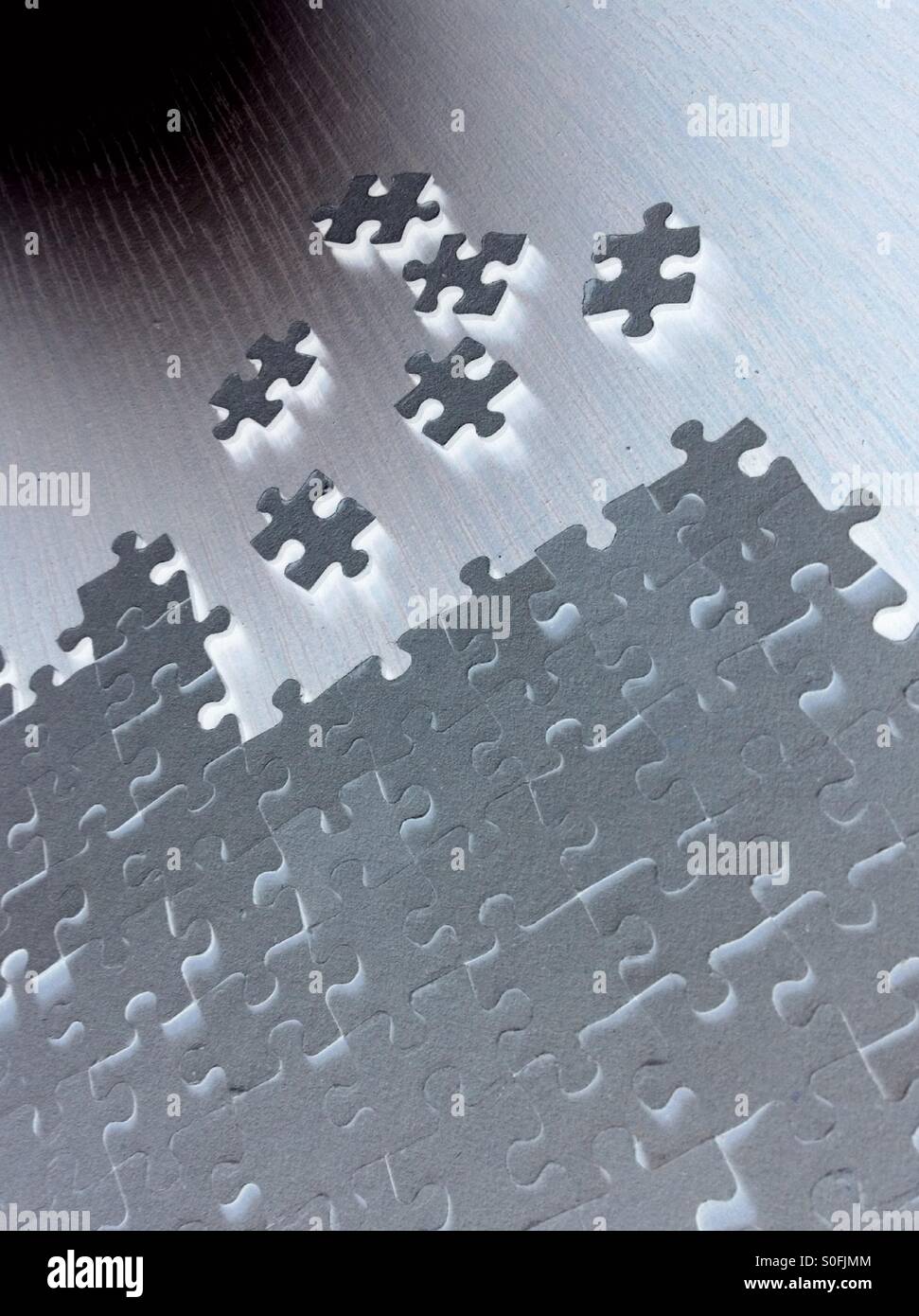 Unvollständige Jigsaw puzzle - Smartphone-aufgenommenes Stockfoto