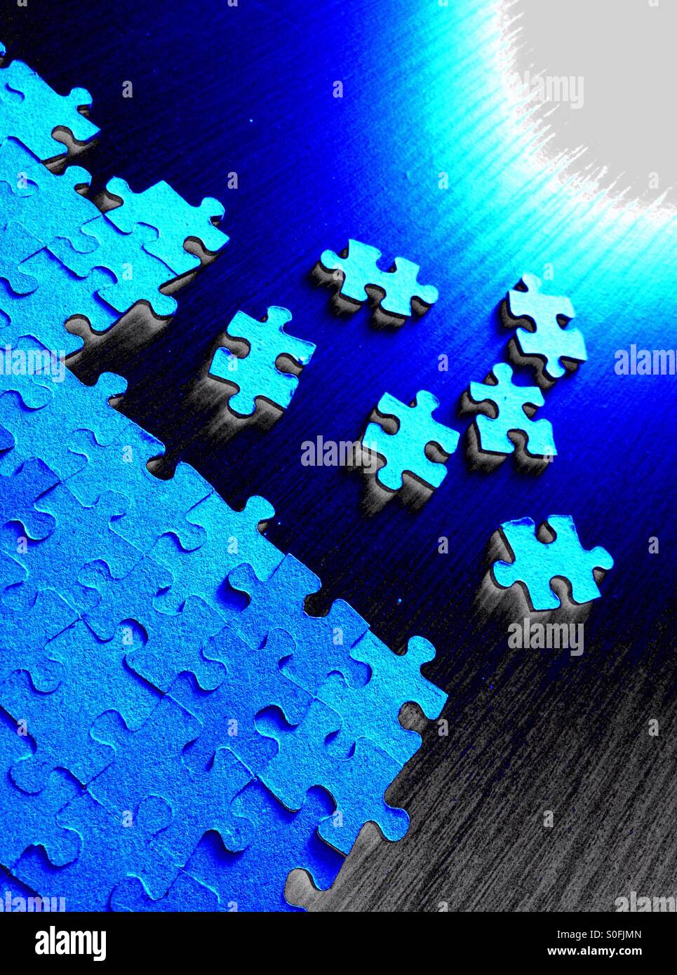 Unvollständige Jigsaw puzzle - Smartphone-aufgenommenes Stockfoto