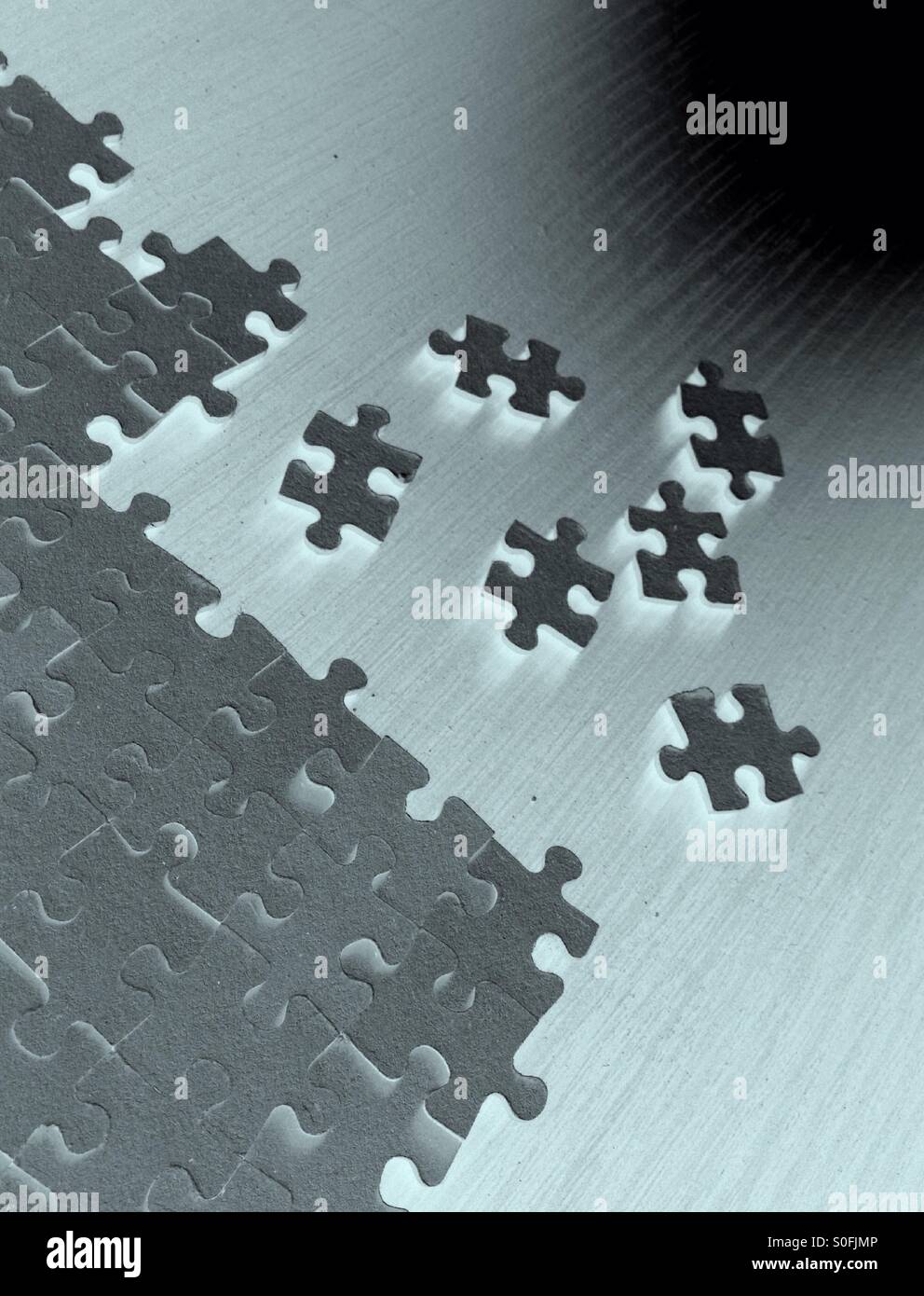 Unvollständige Jigsaw puzzle - Smartphone-aufgenommenes Stockfoto