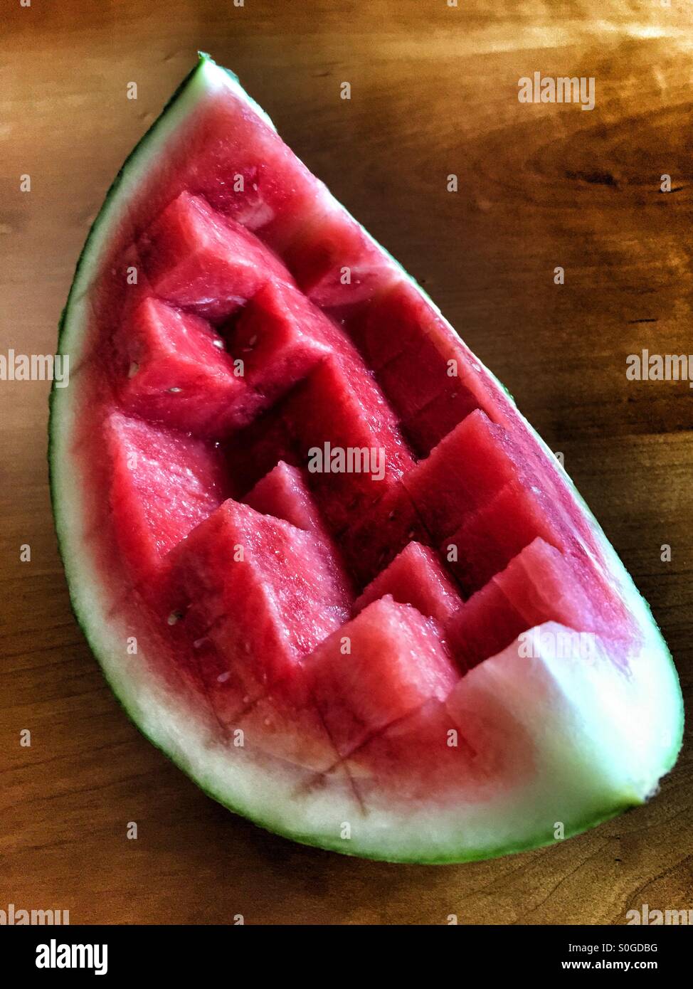 Quartal eine Wassermelone in Würfel geschnitten Stockfoto