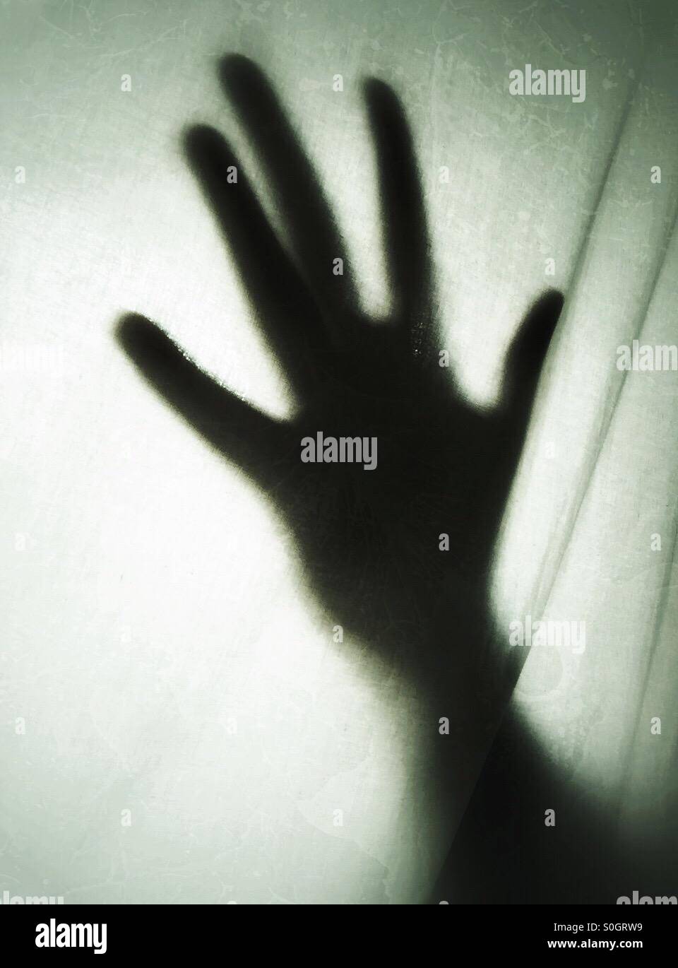 Gruselige Hand Schatten Stockfoto