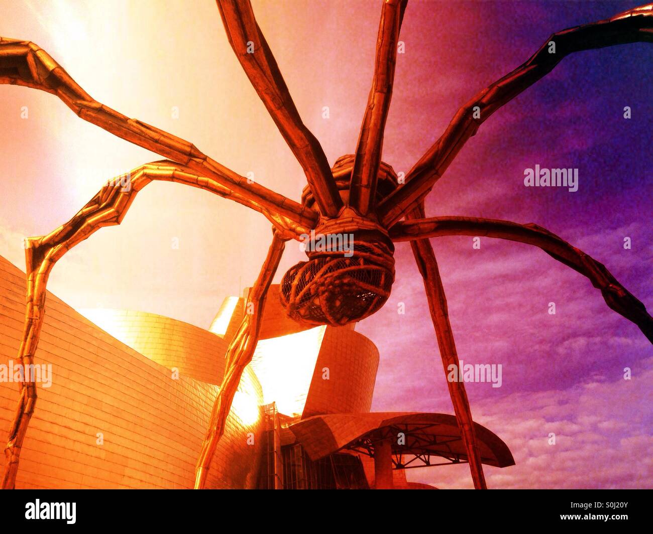 Detail der Spinne Skulptur und das Guggenheim Museum in Bilbao, Spanien Stockfoto