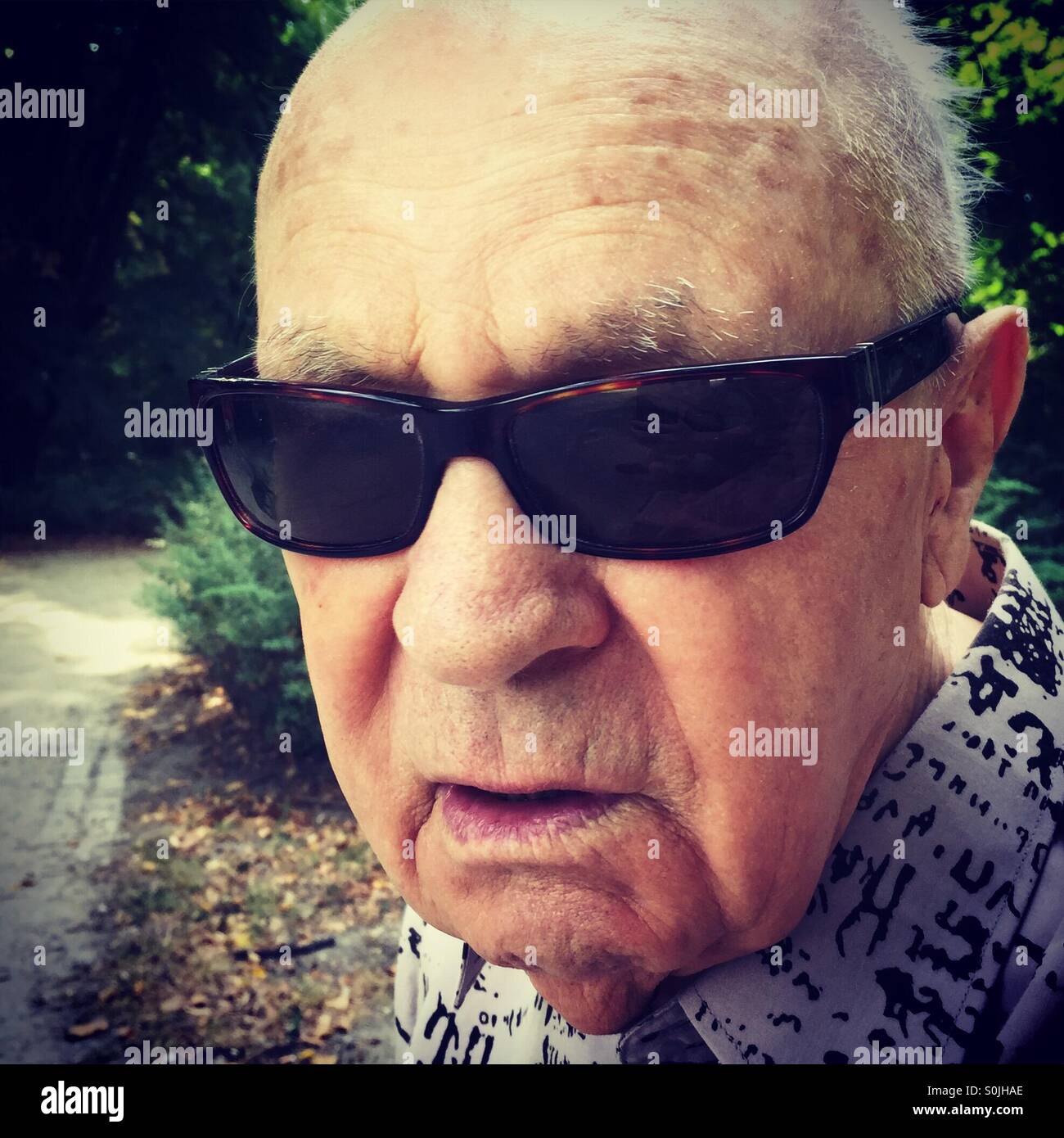 Porträt von senior blinder Mann Stockfoto