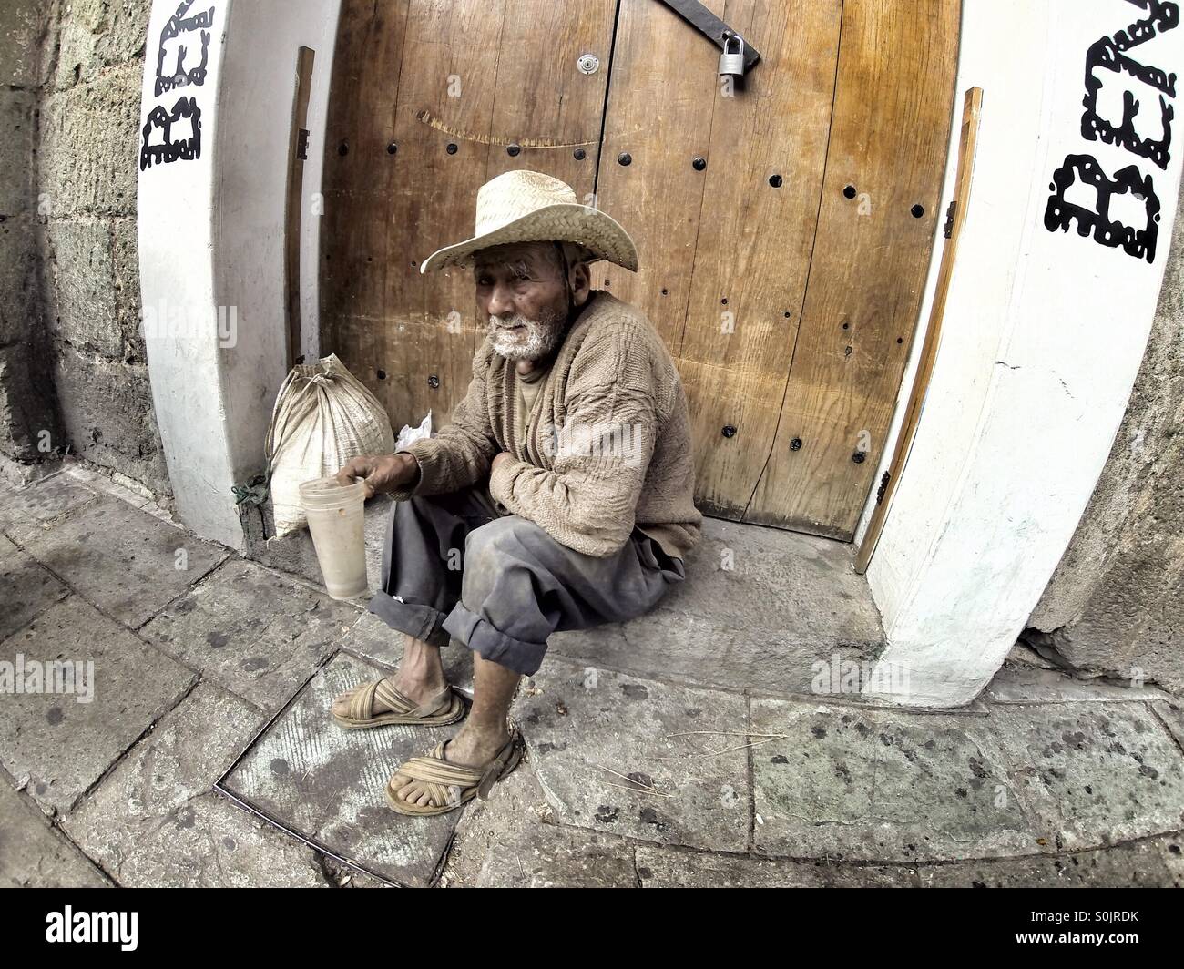 Bettler auf der Straße in Oaxaca, Mexiko Stockfoto