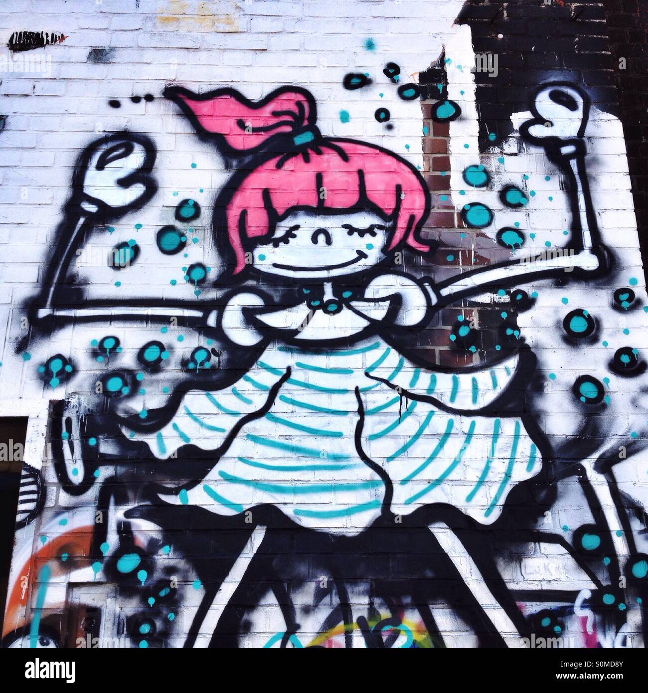 Tanzende Mädchen Graffiti von unbekannten Künstler Stockfoto