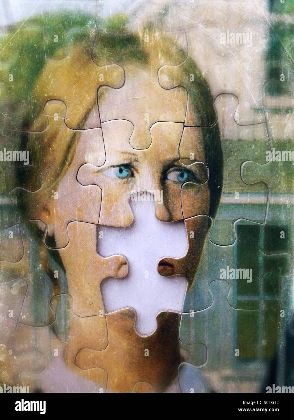 Eine Nahaufnahme der Frau in einer amerikanischen gotische Malerei-Puzzle mit ein fehlendes Stück. Stockfoto