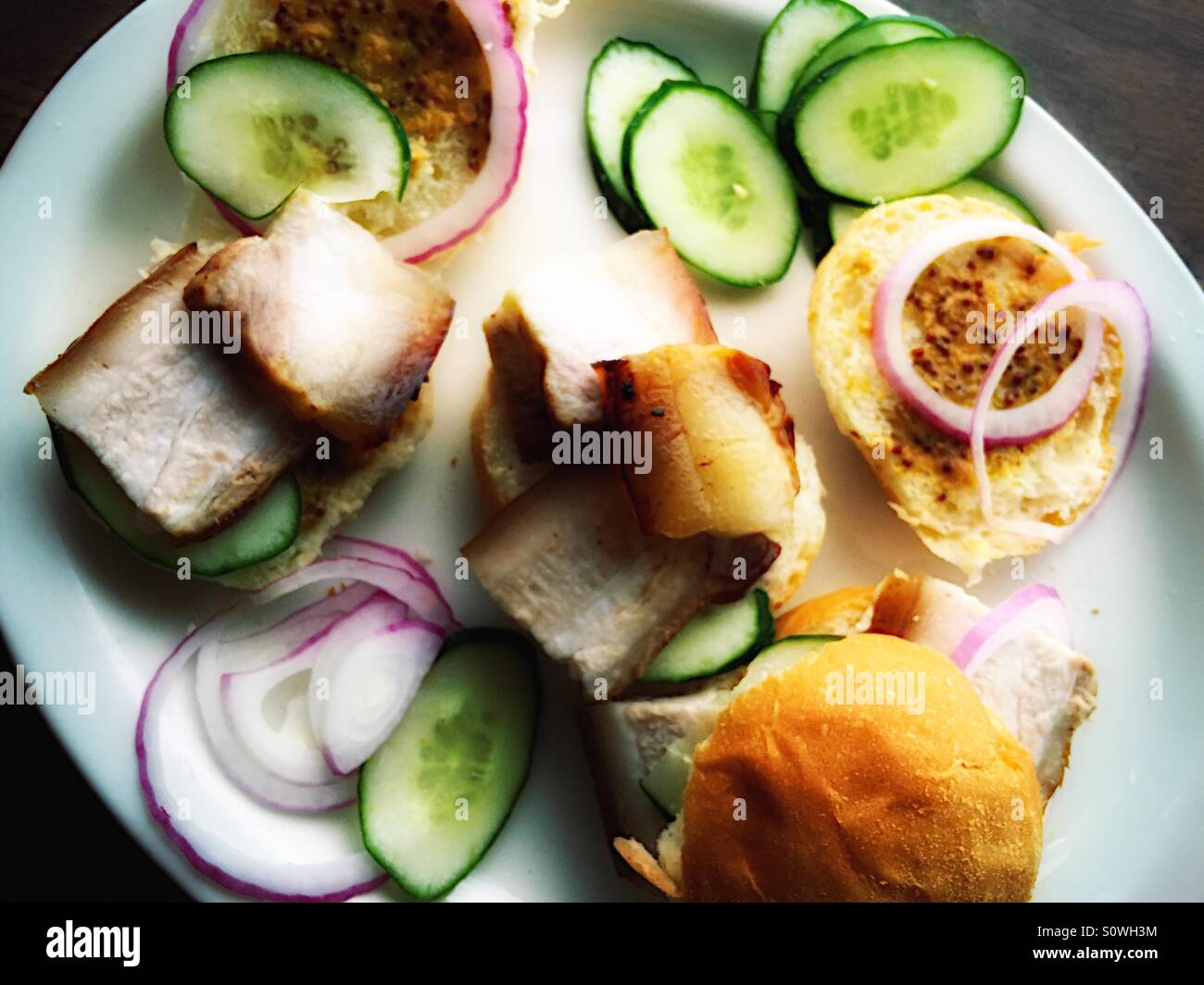 Schweinebauch Schieberegler machen - Smartphone-aufgenommenes Stockfoto