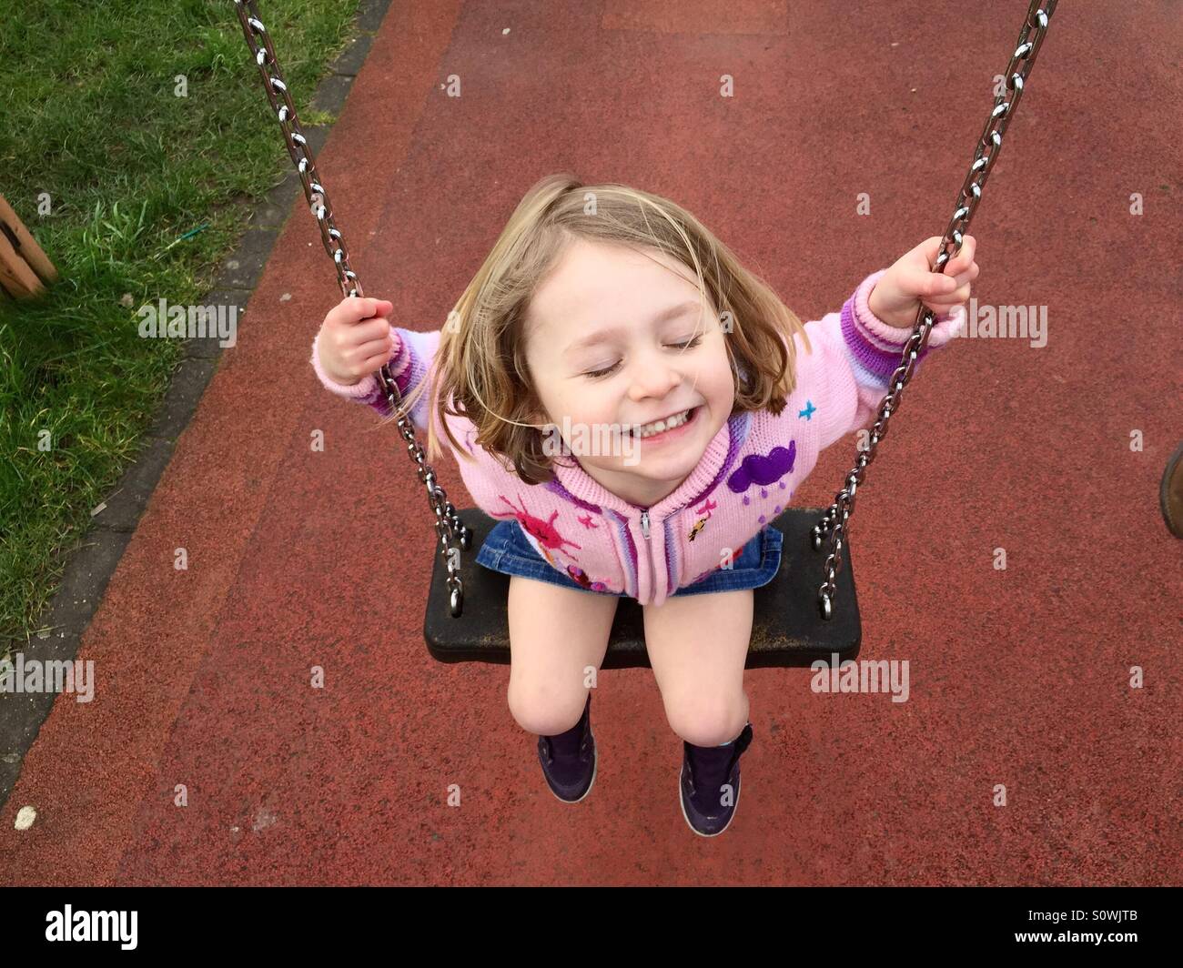 Swinging glücklich Stockfoto