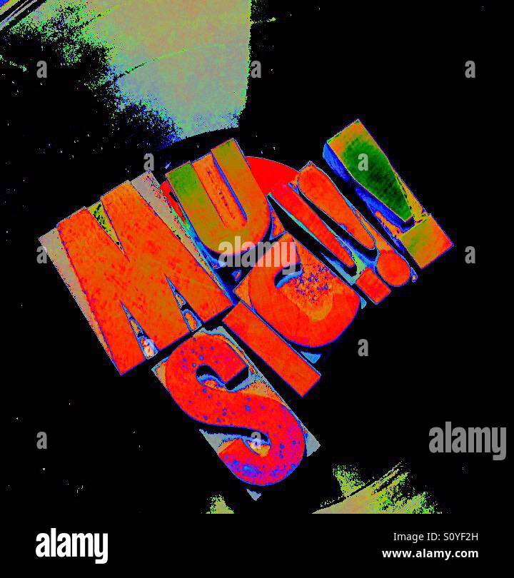 Musik-Wort in Vinyl-Schallplatte - Smartphone-aufgenommenes Stockfoto