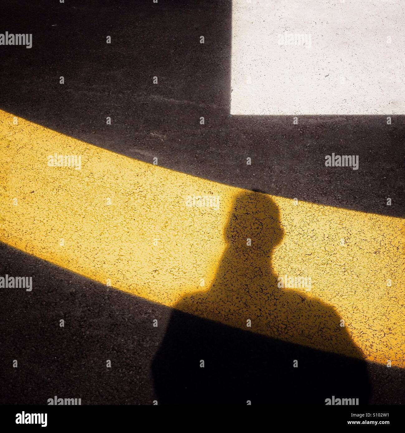 Schatten des Mannes Stockfoto