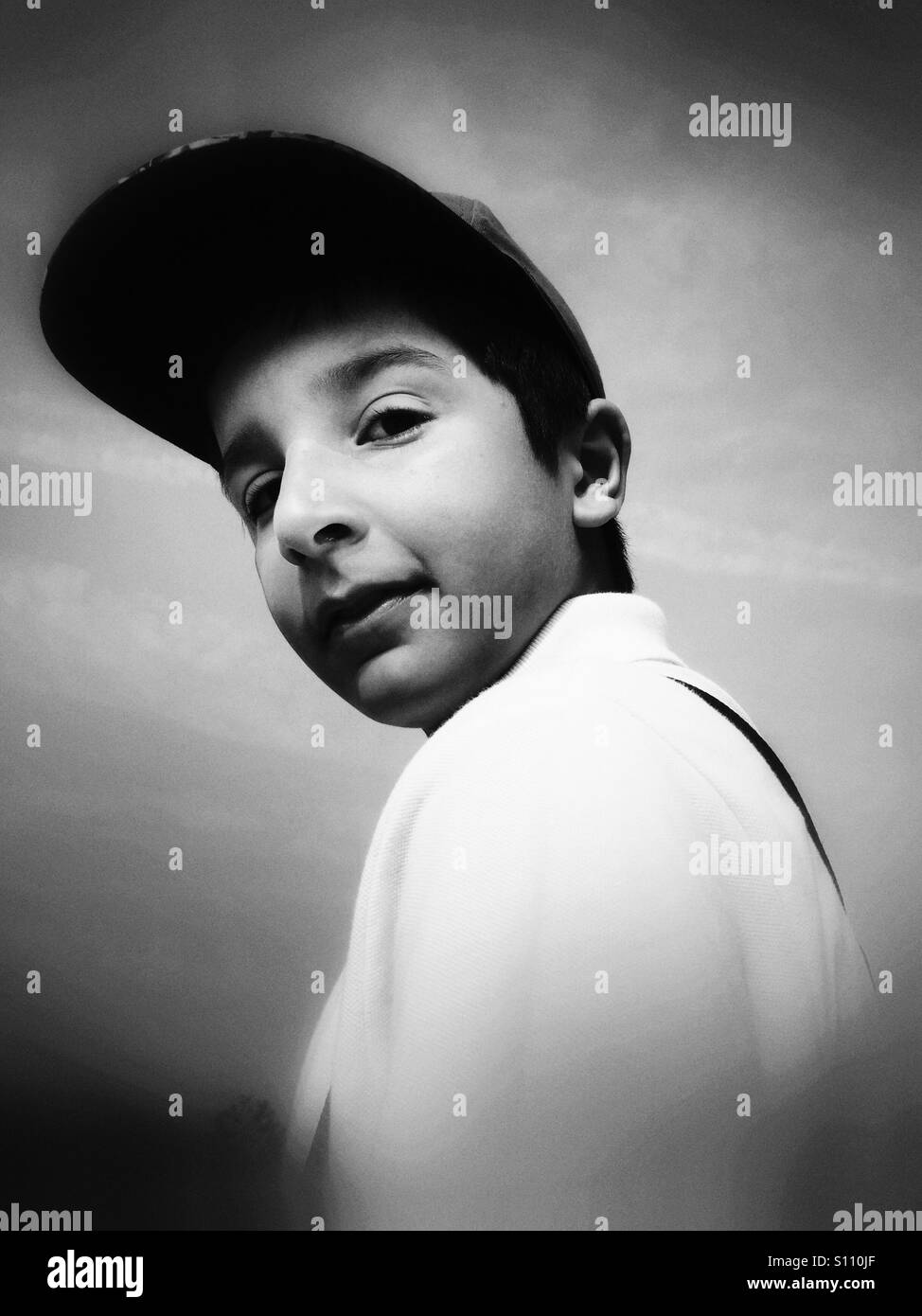 Junge im Baseball-cap Stockfoto