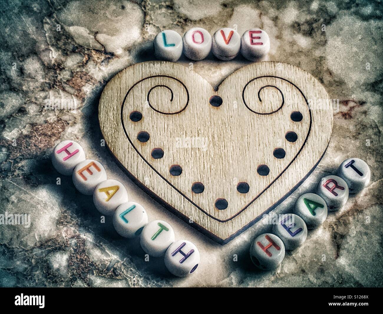 Liebe, Gesundheit, Herz - Smartphone-aufgenommenes Stockfoto