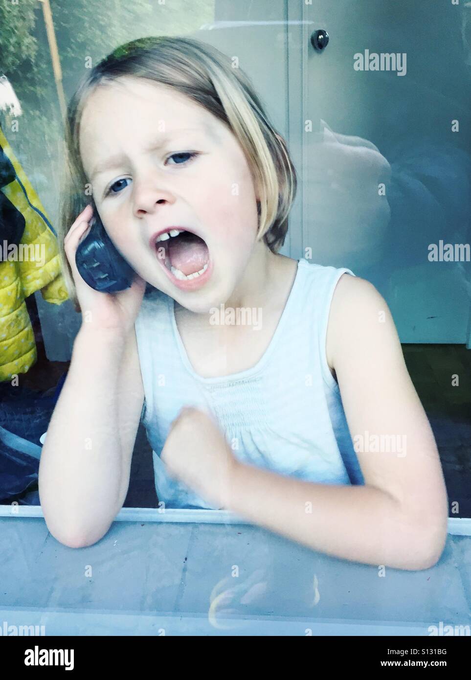 Am Telefon Stockfoto