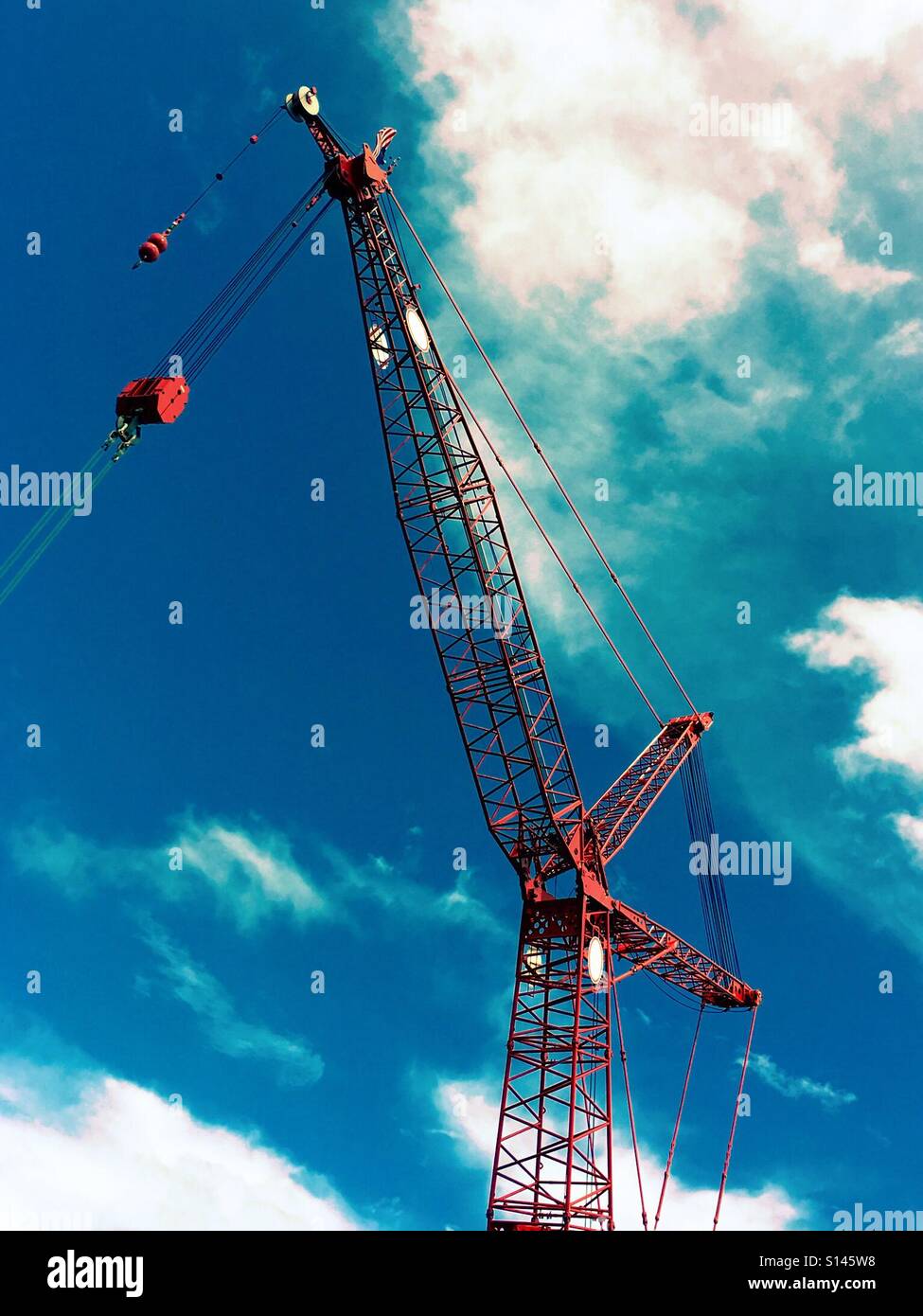 Baukran - Smartphone-aufgenommenes Stockfoto