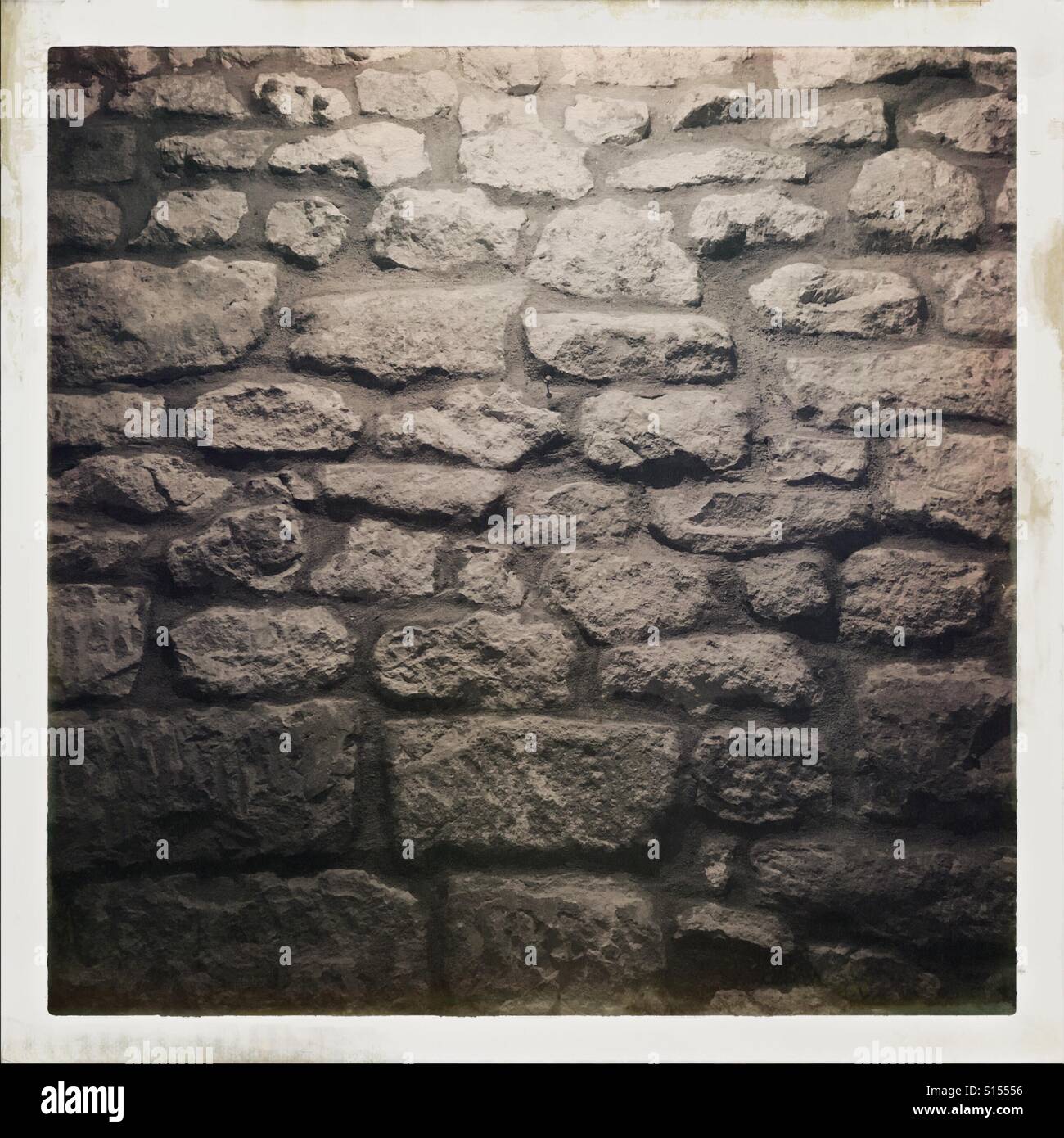 Schwarz / weiß Stein Mauer - Smartphone-aufgenommenes Stockfoto