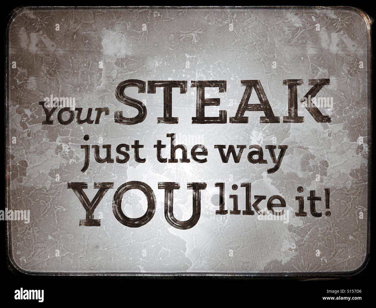 Melden Sie sich an einer Wand Restaurant - "Ihr STEAK so YOU like it!"  Vegetarier wegschauen jetzt bitte! Bildnachweis - © COLIN HOSKINS. - Smartphone-aufgenommenes Stockfoto