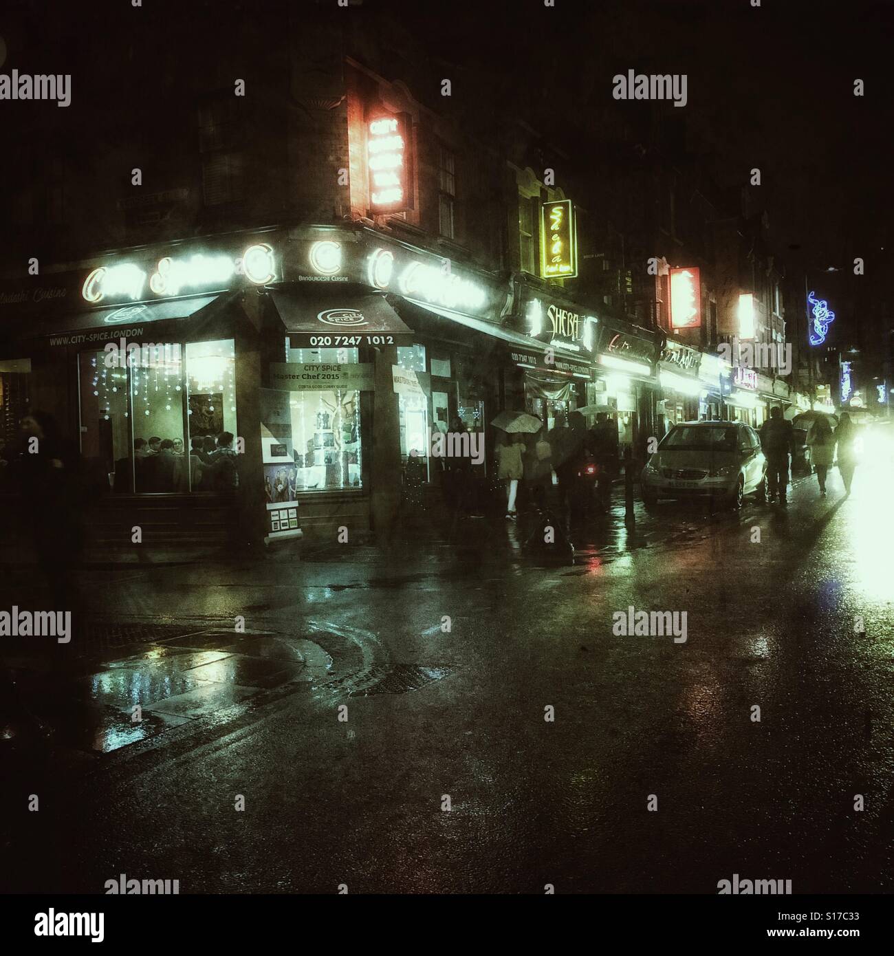 Brick Lane nasse Nacht Stockfoto